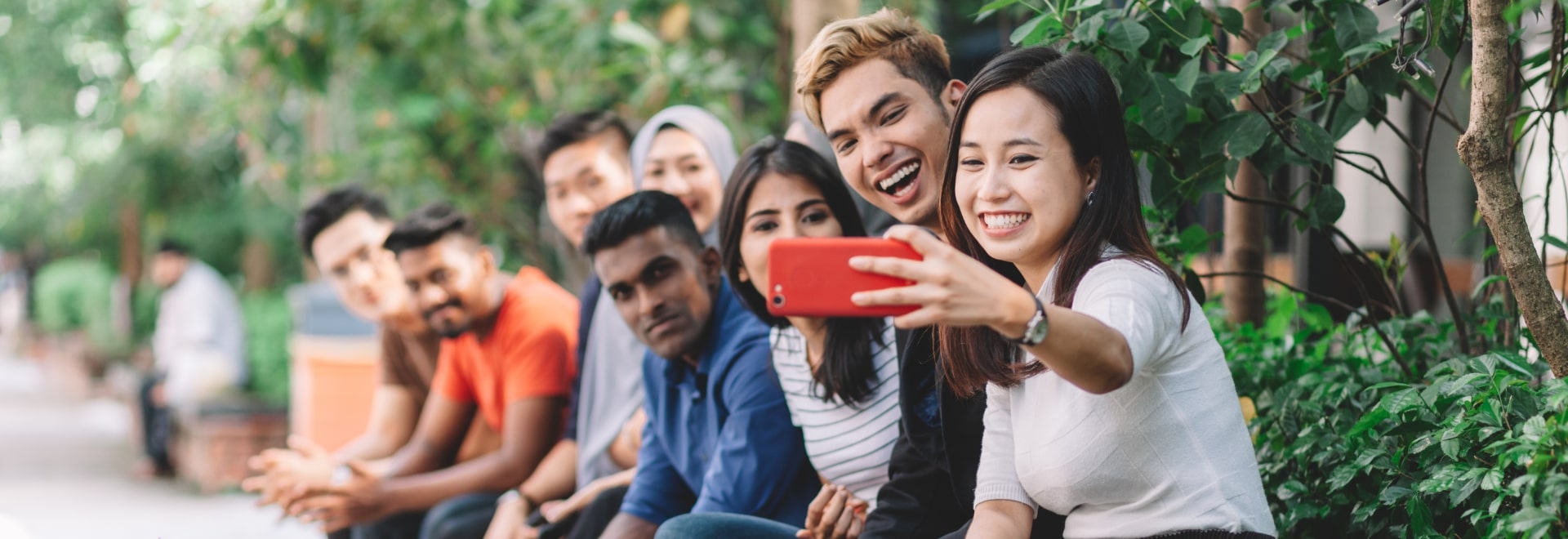 group of students in a line taking a selfie